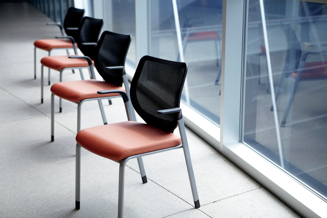 HON Nucleus chairs, black mesh top, coral cushion
