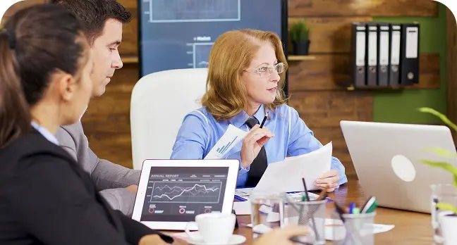 corporate-female-business-trainer-discussing-finan-2025-02-19-07-43-56-utc 1-1